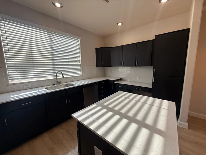 Kitchen counters and island after a Greater Phoenix Cleaning deep clean in Biltmore