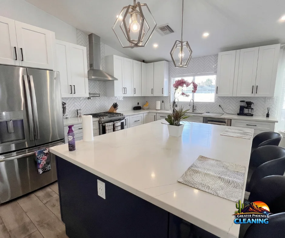White kitchen and island after a Greater Phoenix Cleaning home cleaning
